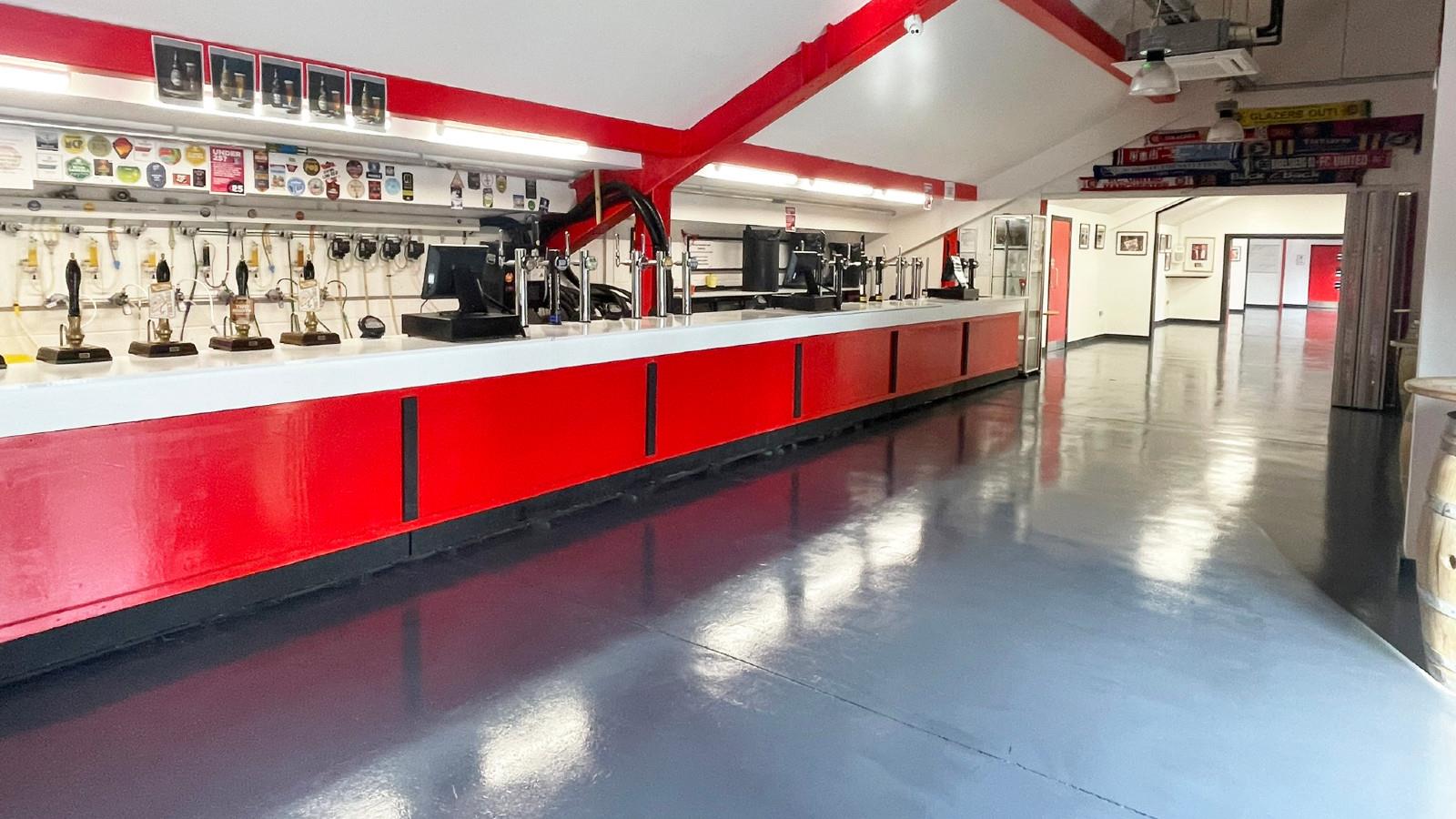 Durable Floor Coating Transforms FC United's SMRE Bar image