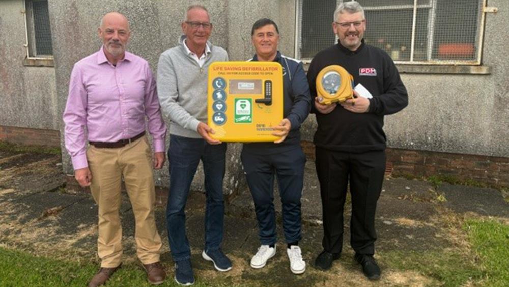 PDM donates defibrillator to local football team image